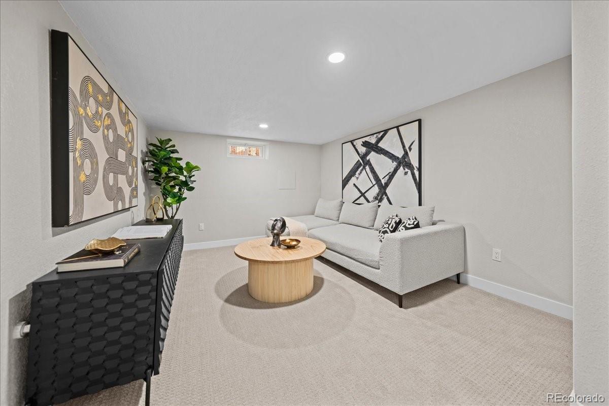 1378 Forest Street Denver, CO 80220 - Photo 28 of 50 a living room with furniture and a potted plant