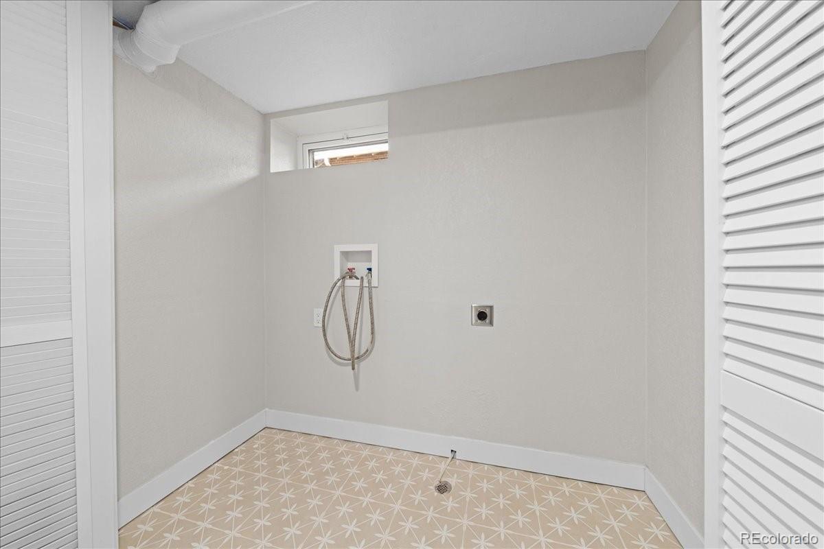 1378 Forest Street Denver, CO 80220 - Photo 37 of 50 a view of a room with rack on the wall