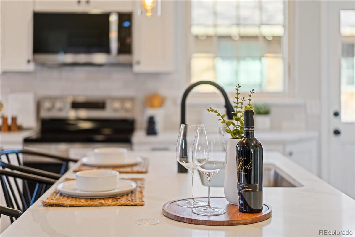 1378 Forest Street Denver, CO 80220 - Photo 10 of 50 a close view of light kitchen