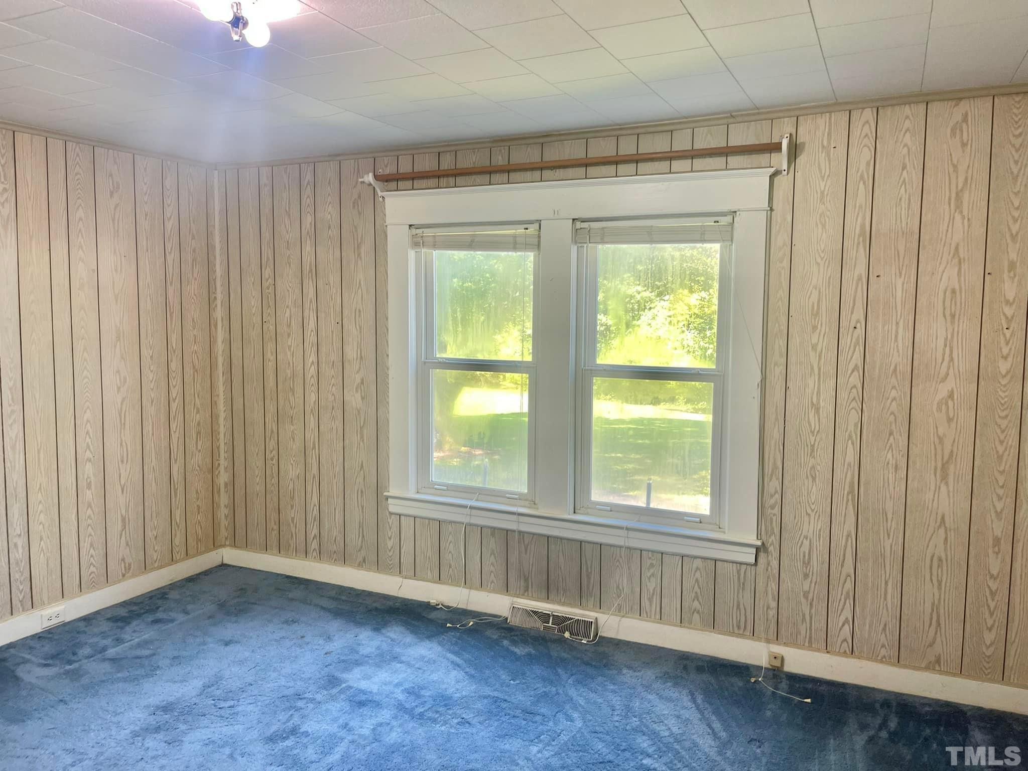 88 Cavel Chub Lake Road Roxboro, NC 27574 - Photo 12 of 20 an empty room with a window