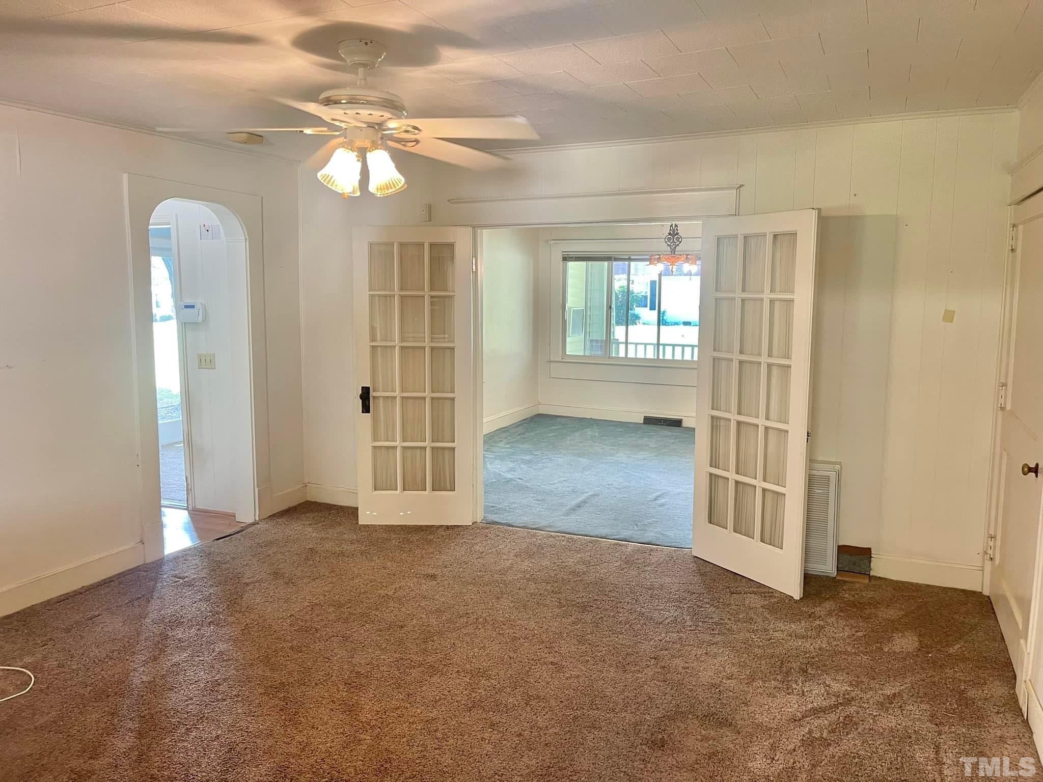 88 Cavel Chub Lake Road Roxboro, NC 27574 - Photo 8 of 20 an empty room with windows and closet