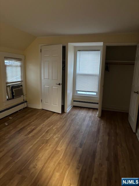 333 Maple Avenue Oradell, NJ 07649 - Photo 11 of 16 an empty room with wooden floor fireplace and windows