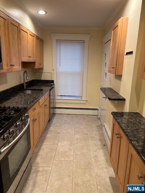 333 Maple Avenue Oradell, NJ 07649 - Photo 5 of 16 a kitchen with stainless steel appliances granite countertop a stove and a sink