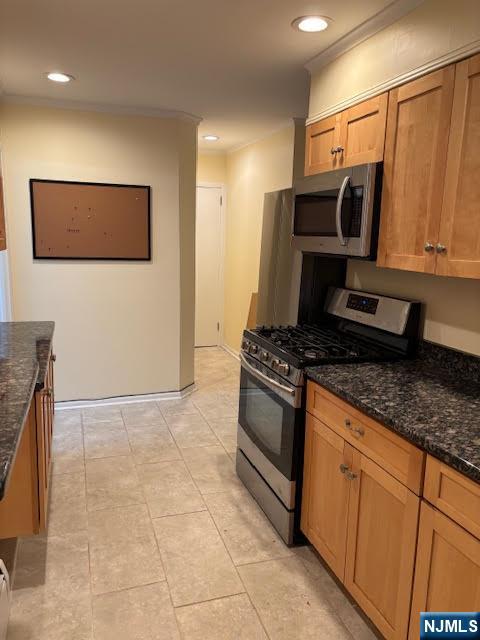 333 Maple Avenue Oradell, NJ 07649 - Photo 6 of 16 a kitchen with stainless steel appliances granite countertop a stove a sink and a microwave