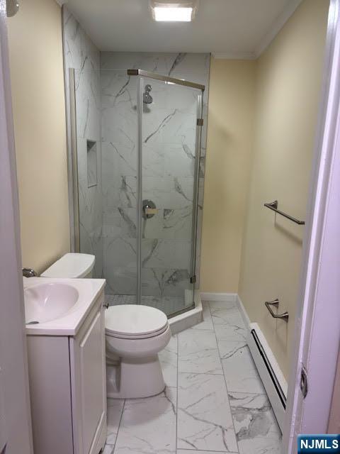 333 Maple Avenue Oradell, NJ 07649 - Photo 9 of 16 a bathroom with a sink a toilet and shower