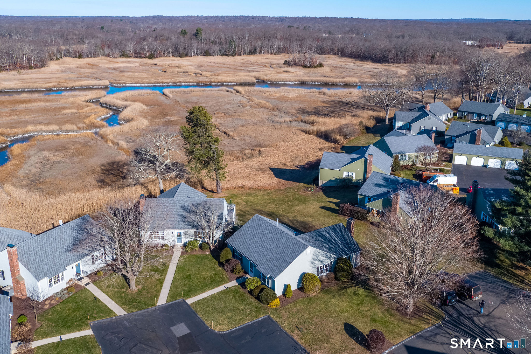1 Downing Way, Unit 1 Madison, CT 06443 - Photo 24 of 26 an aerial view of residential houses with outdoor space