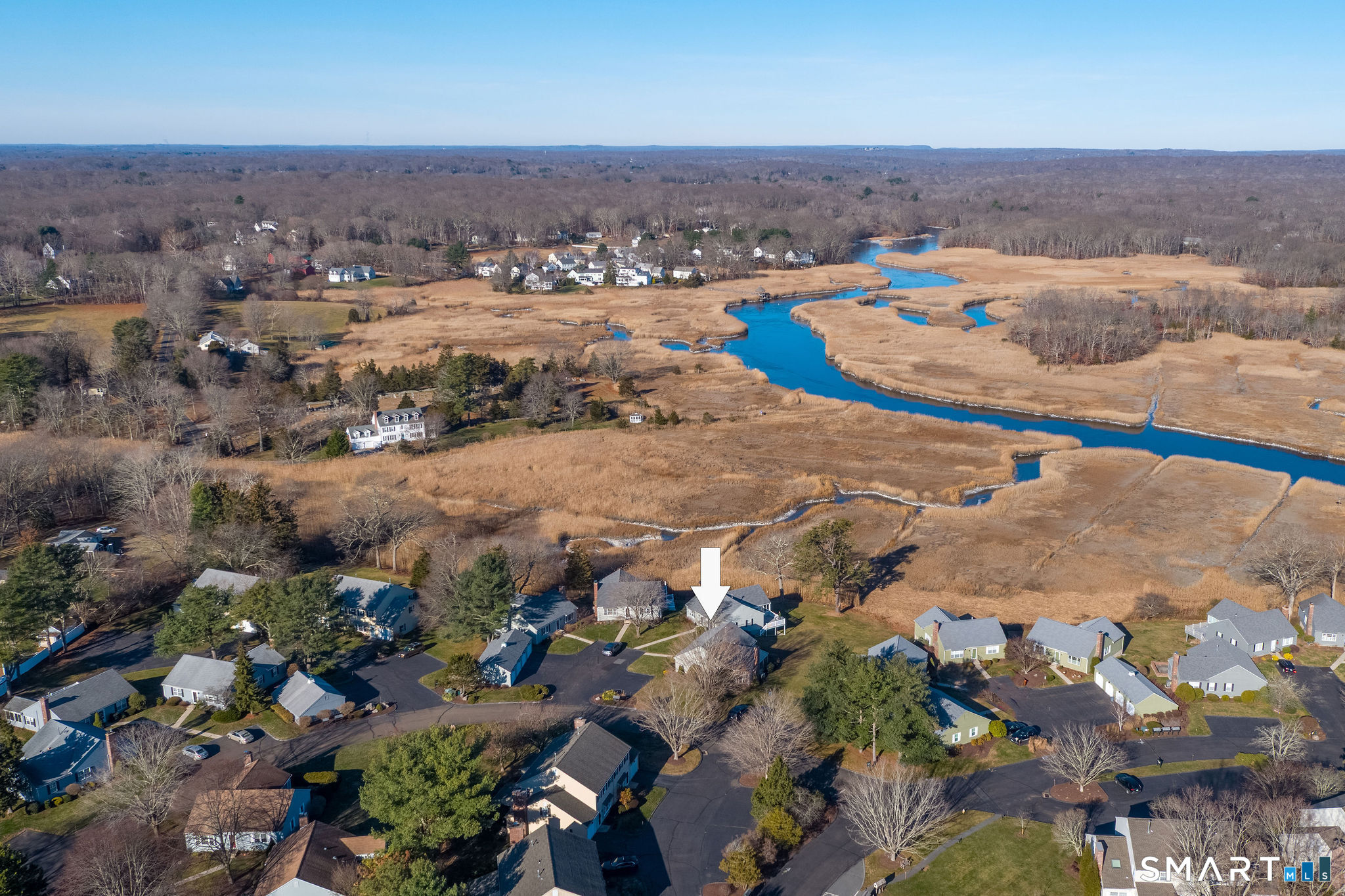1 Downing Way, Unit 1 Madison, CT 06443 - Photo 3 of 26 an aerial view of residential houses with outdoor space