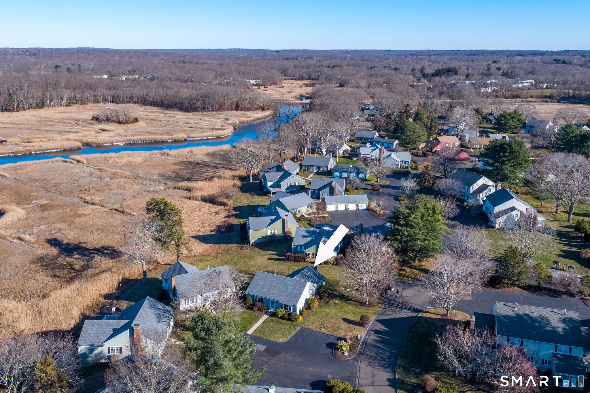 1 Downing Way, Unit 1 Madison, CT 06443 - Photo 4 of 26 an aerial view of a houses with a yard