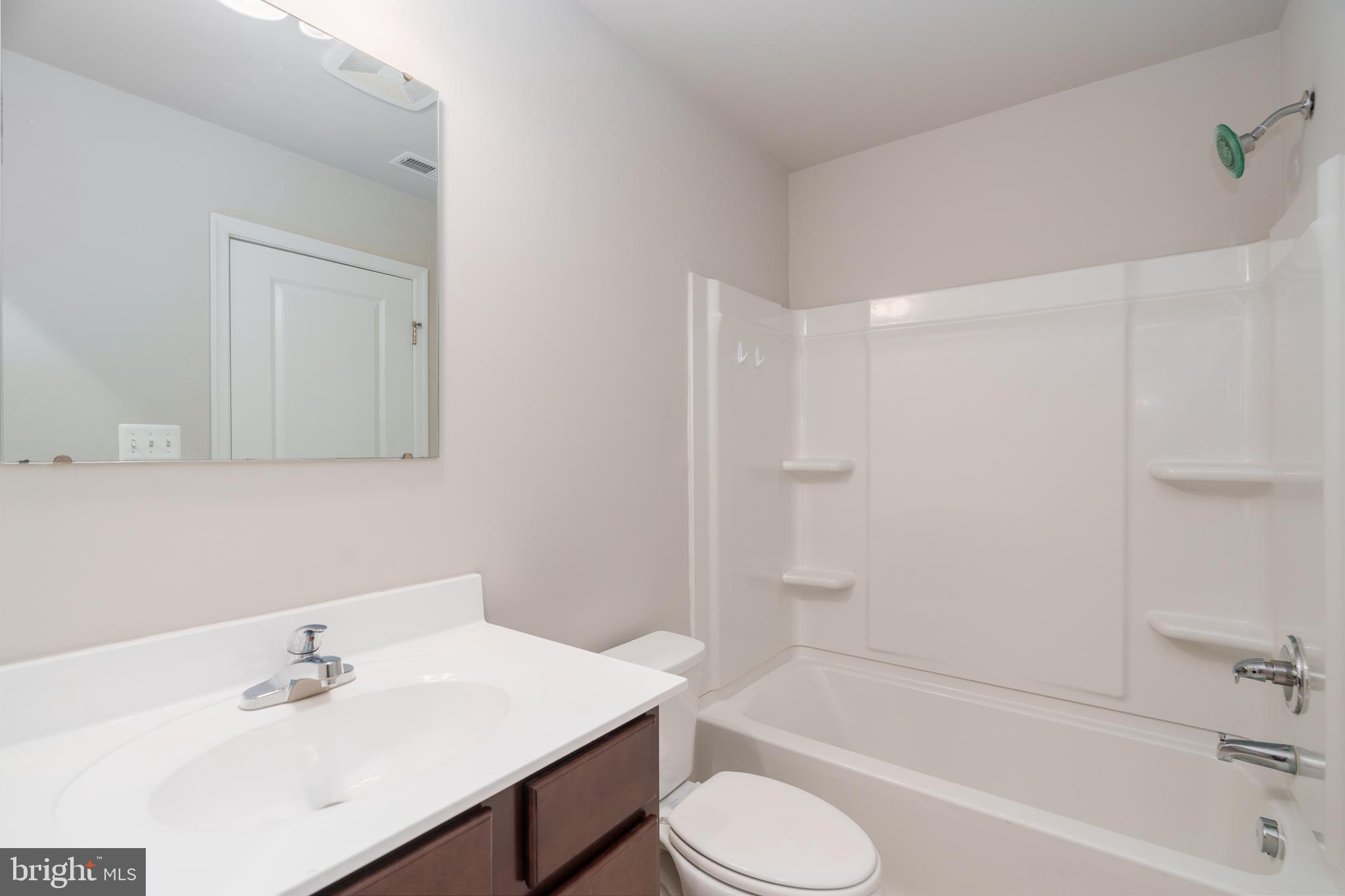 4 Marsh Lane Elkton, MD 21921 - Photo 11 of 14 a bathroom with a sink toilet and bathtub