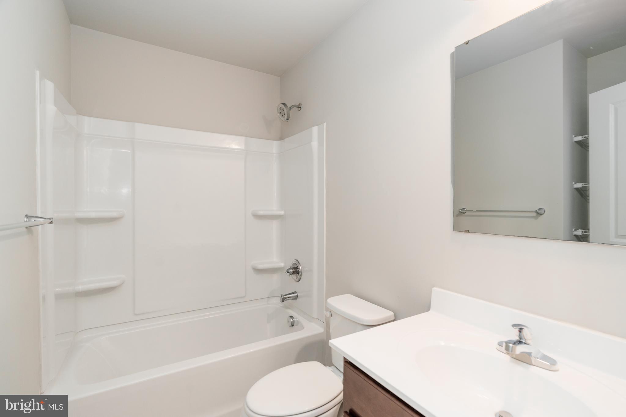 4 Marsh Lane Elkton, MD 21921 - Photo 10 of 14 a bathroom with a sink toilet and bathtub