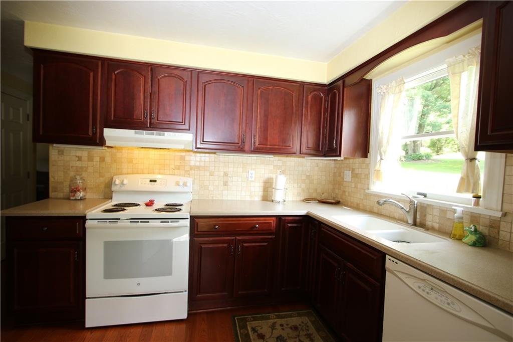 8 Momeyer Road Monongahela, PA 15063 - Photo 3 of 25 Gorgeous 14x10 Kitchen w/ Newer Cherry wood Cabinets, Ceramic Tile Backsplash & 3/4" Hardwood Floors