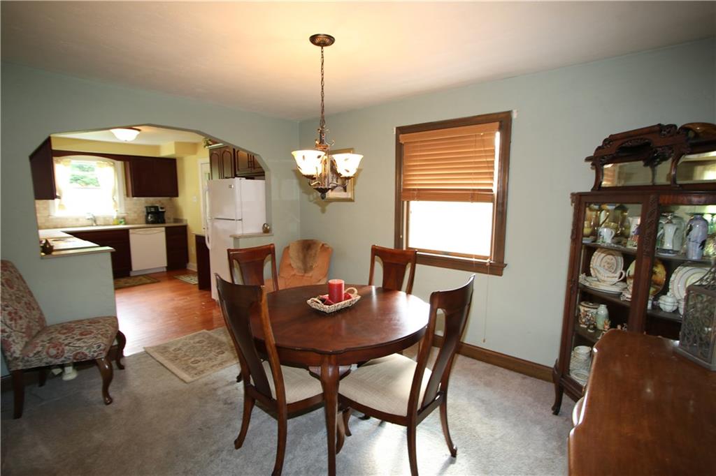 8 Momeyer Road Monongahela, PA 15063 - Photo 4 of 25 Newer Carpeting in 14x10 Dining Room w/ Newer Carpeting, Plaster Walls, Attractive Light Fixture & Beautiful Wood Trimwork