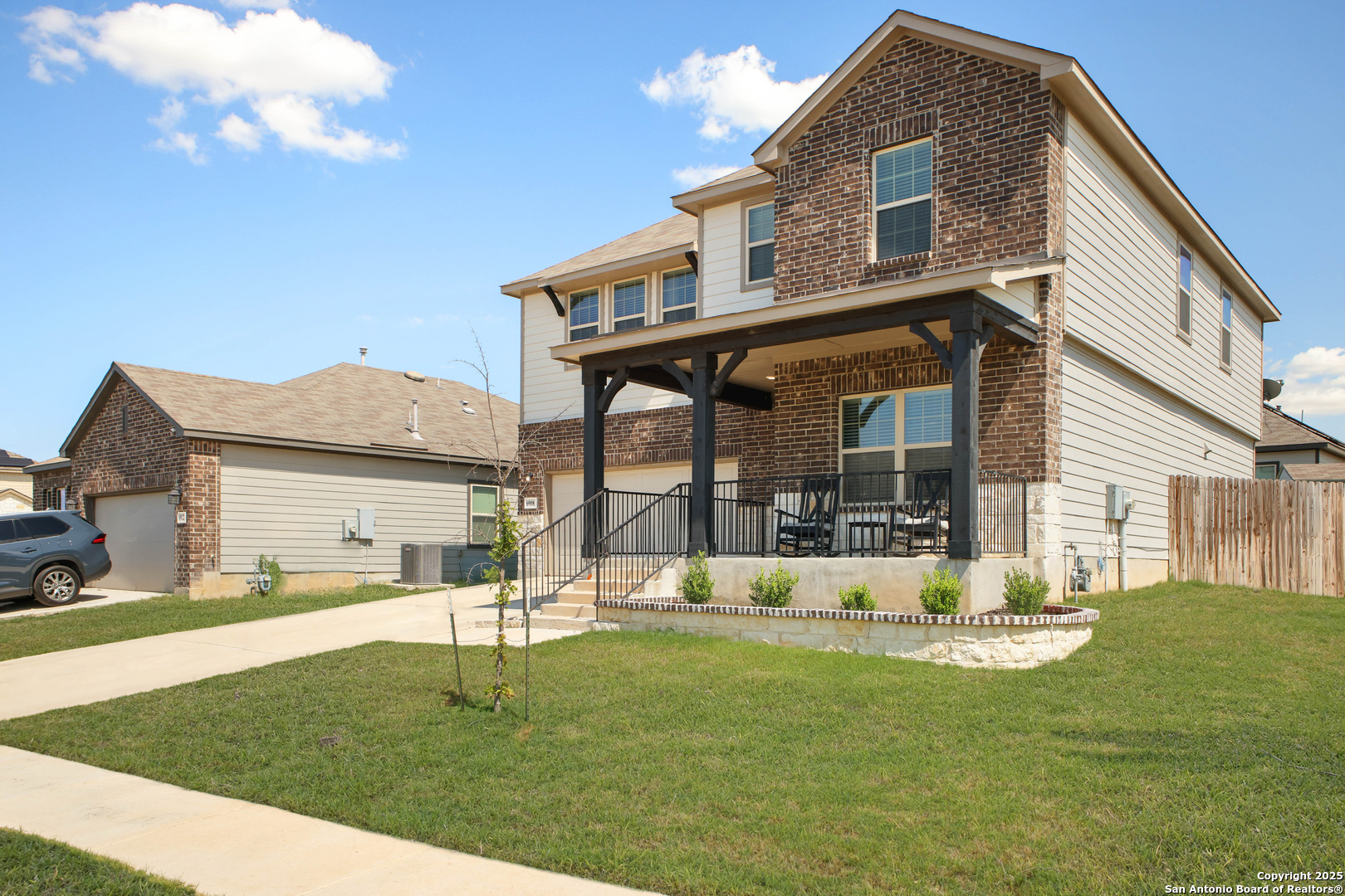 6908 Opus Lane Converse, TX 78109 - Photo 4 of 41 a view of a house with a yard