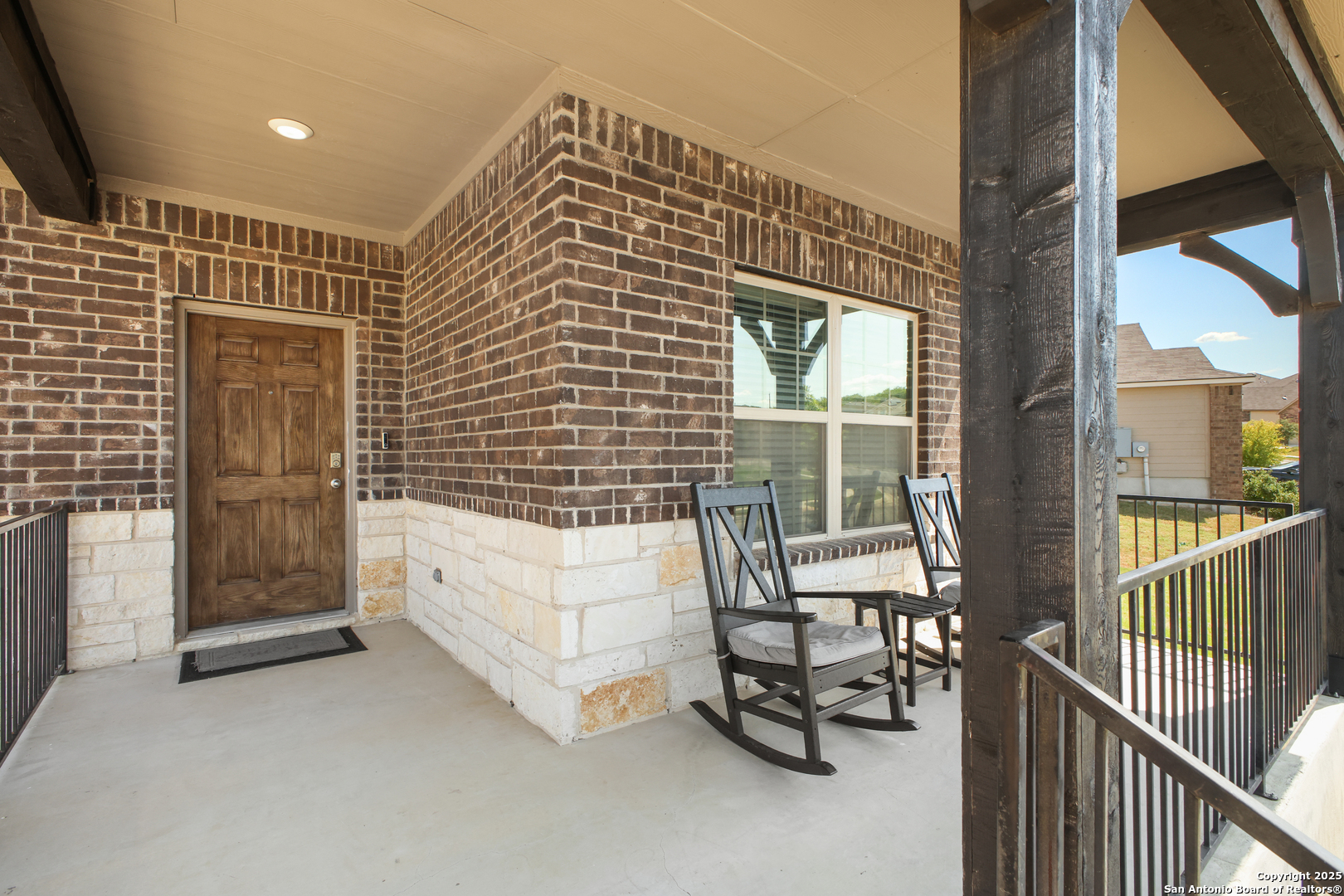 6908 Opus Lane Converse, TX 78109 - Photo 6 of 41 a view of a balcony with chairs