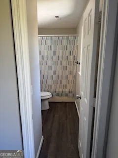 a view of a bathroom with a sink and a shower