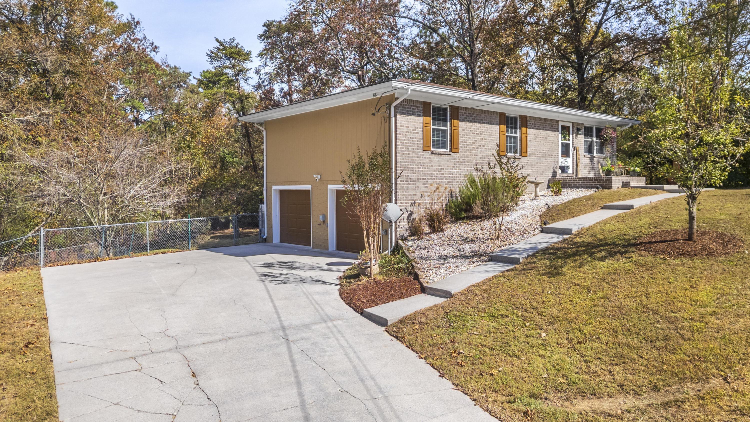 7111 Fine Lane Harrison, TN 37341 - Photo 3 of 28 Side-Load 2 Car Garage