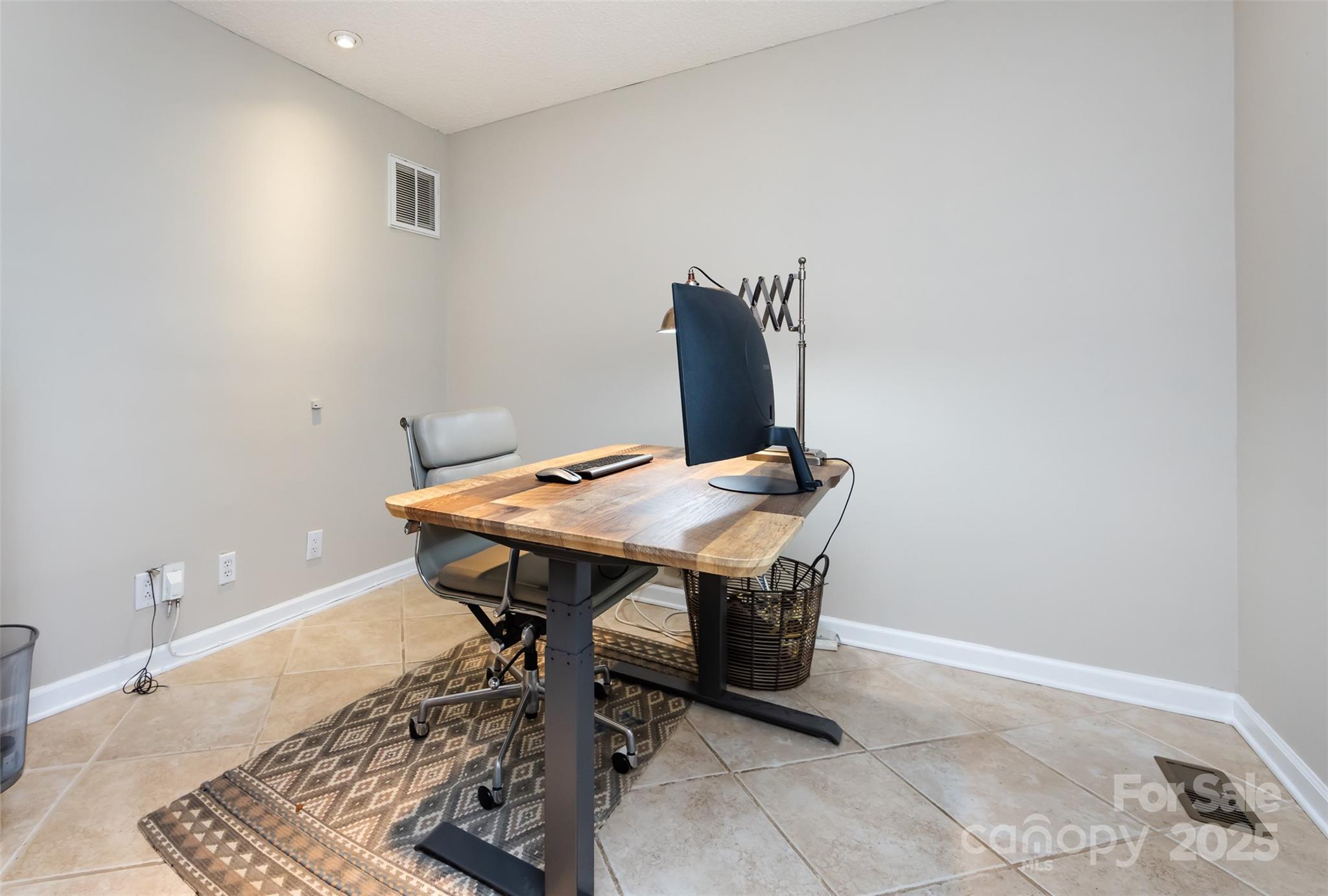 5013 Cedar Forest Drive Charlotte, NC 28226 - Photo 11 of 46 a view of a workspace with furniture