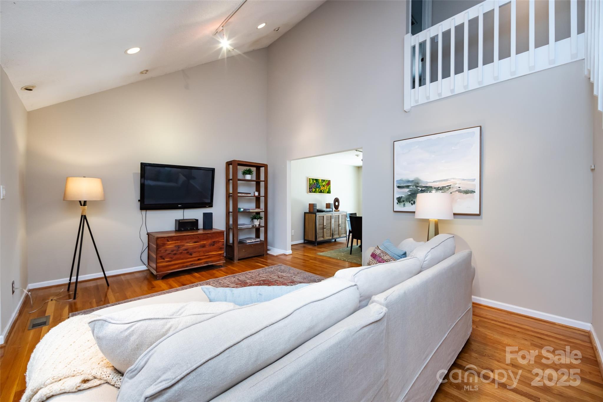 5013 Cedar Forest Drive Charlotte, NC 28226 - Photo 16 of 46 a bedroom with furniture and a flat screen tv