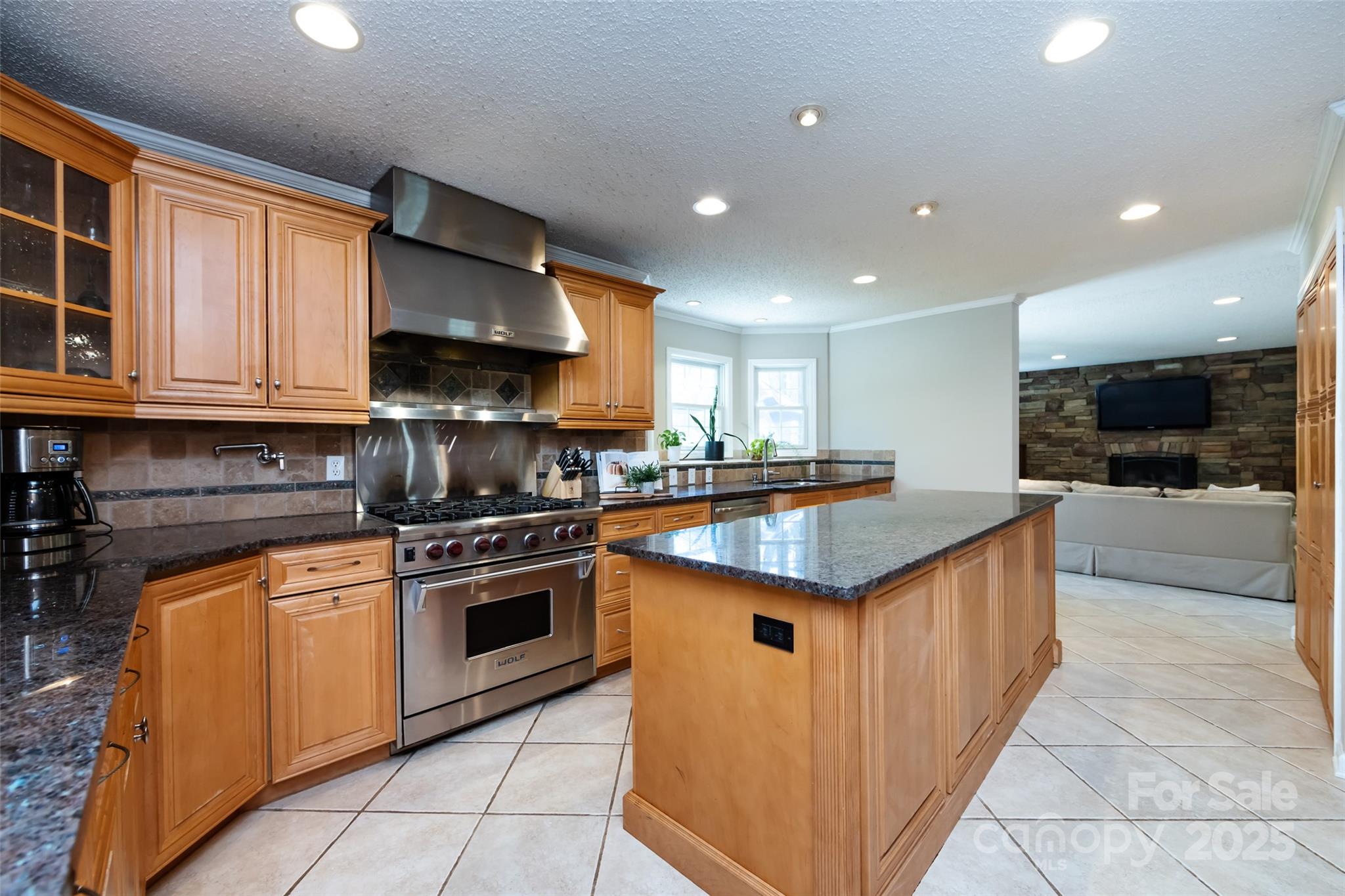 5013 Cedar Forest Drive Charlotte, NC 28226 - Photo 21 of 46 a kitchen with stainless steel appliances granite countertop a stove and a sink