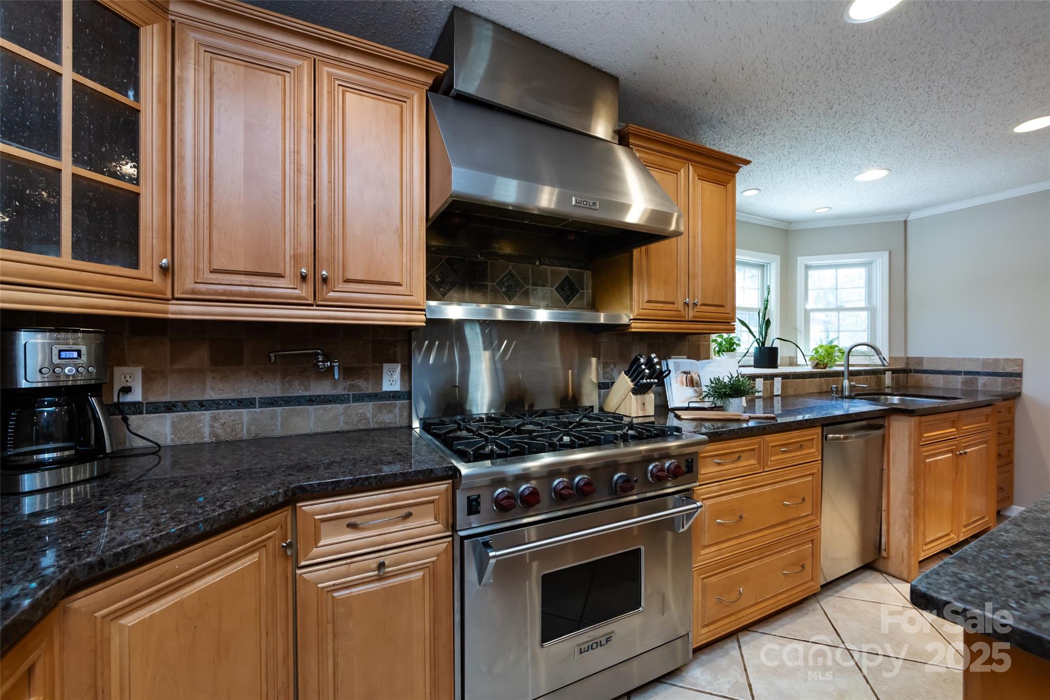 5013 Cedar Forest Drive Charlotte, NC 28226 - Photo 22 of 46 a kitchen with granite countertop stainless steel appliances and cabinets