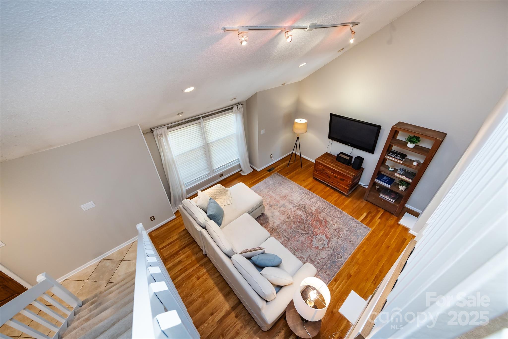5013 Cedar Forest Drive Charlotte, NC 28226 - Photo 29 of 46 a bed room with a bed and a television