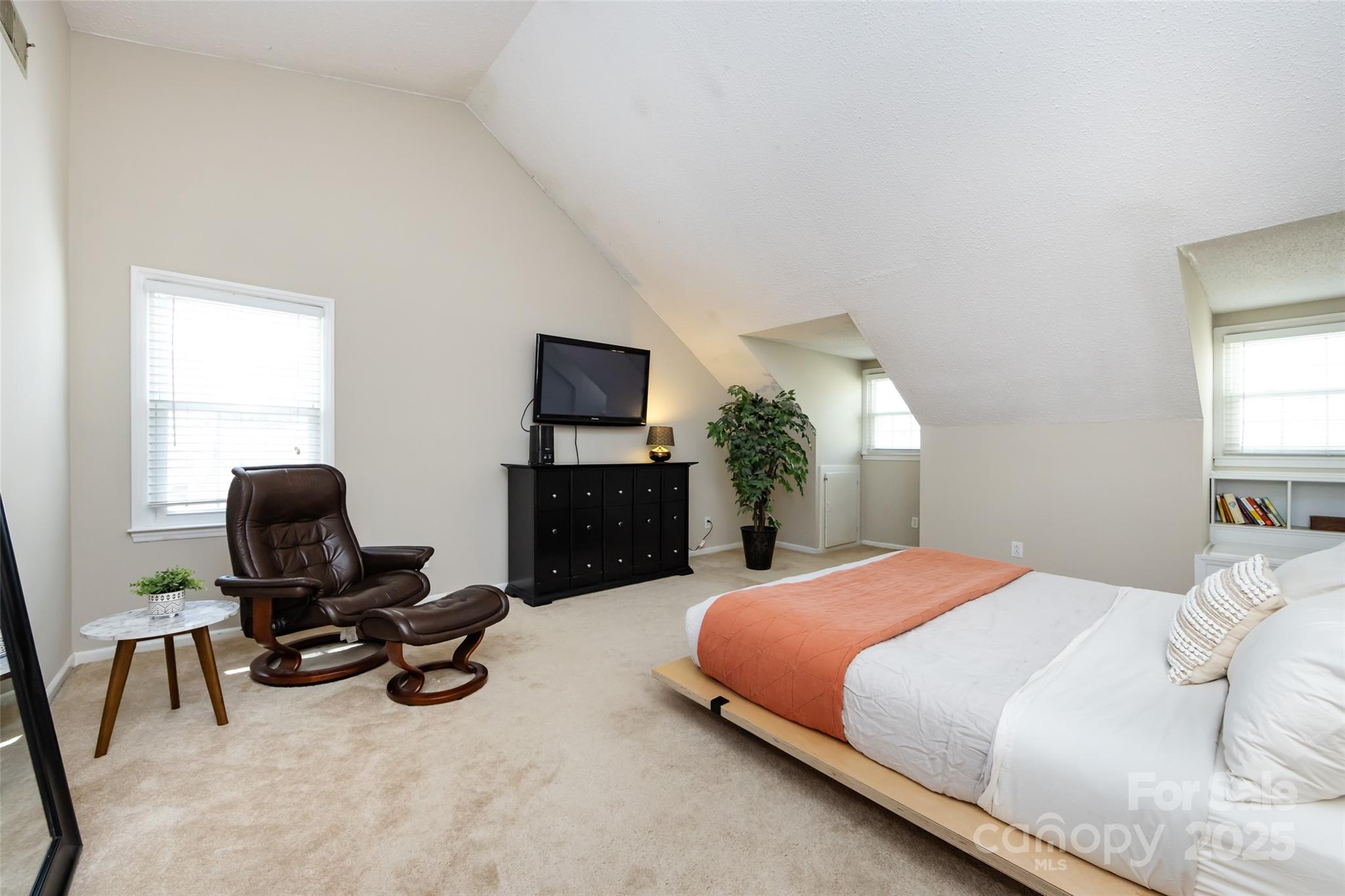 5013 Cedar Forest Drive Charlotte, NC 28226 - Photo 30 of 46 a bedroom with a bed and a chair