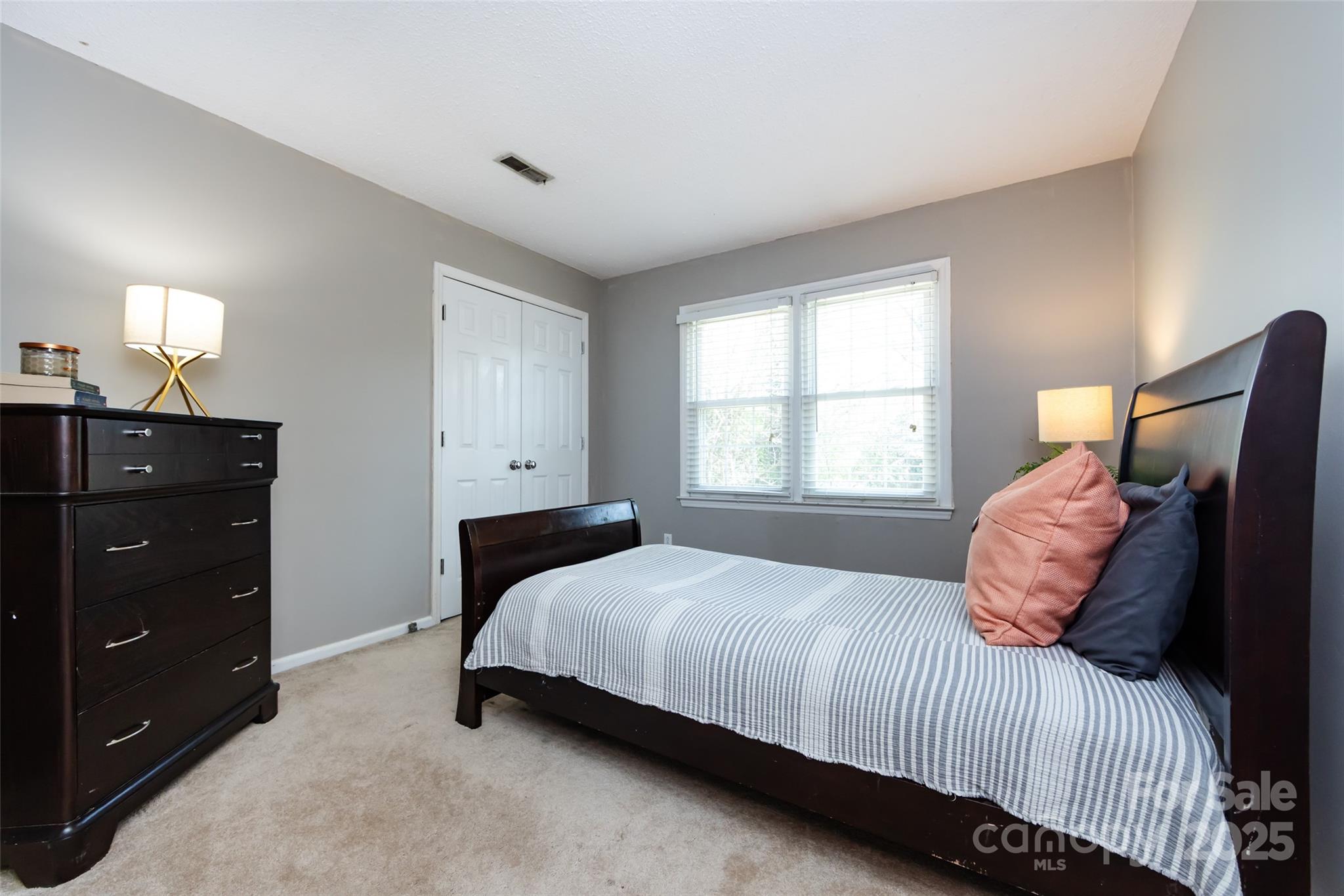 5013 Cedar Forest Drive Charlotte, NC 28226 - Photo 38 of 46 a bedroom with a bed and window