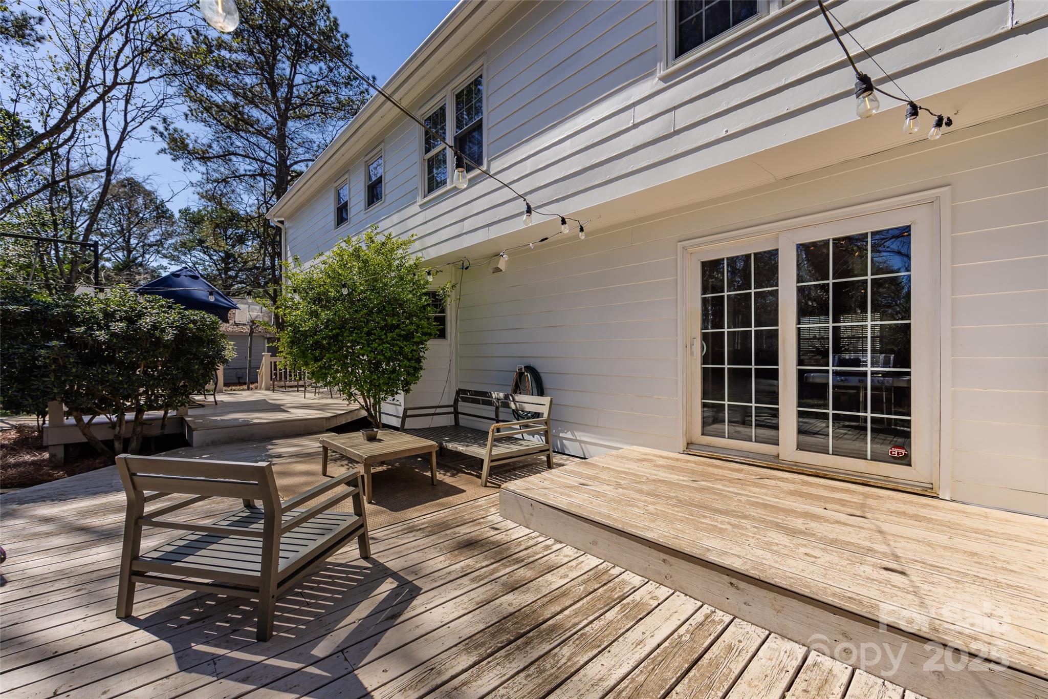 5013 Cedar Forest Drive Charlotte, NC 28226 - Photo 40 of 46 a view of a roof deck with wooden floor and fence