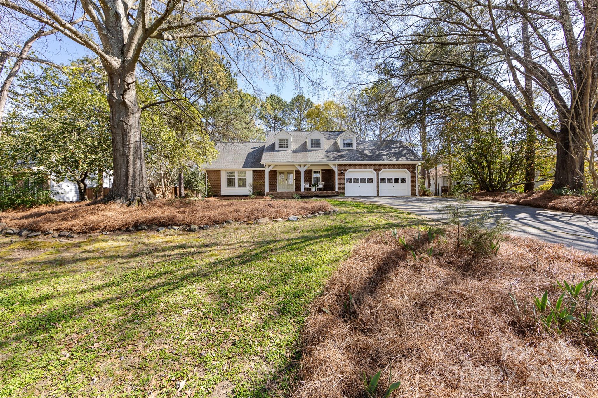 5013 Cedar Forest Drive Charlotte, NC 28226 - Photo 4 of 46 a front view of residential houses with yard and trees