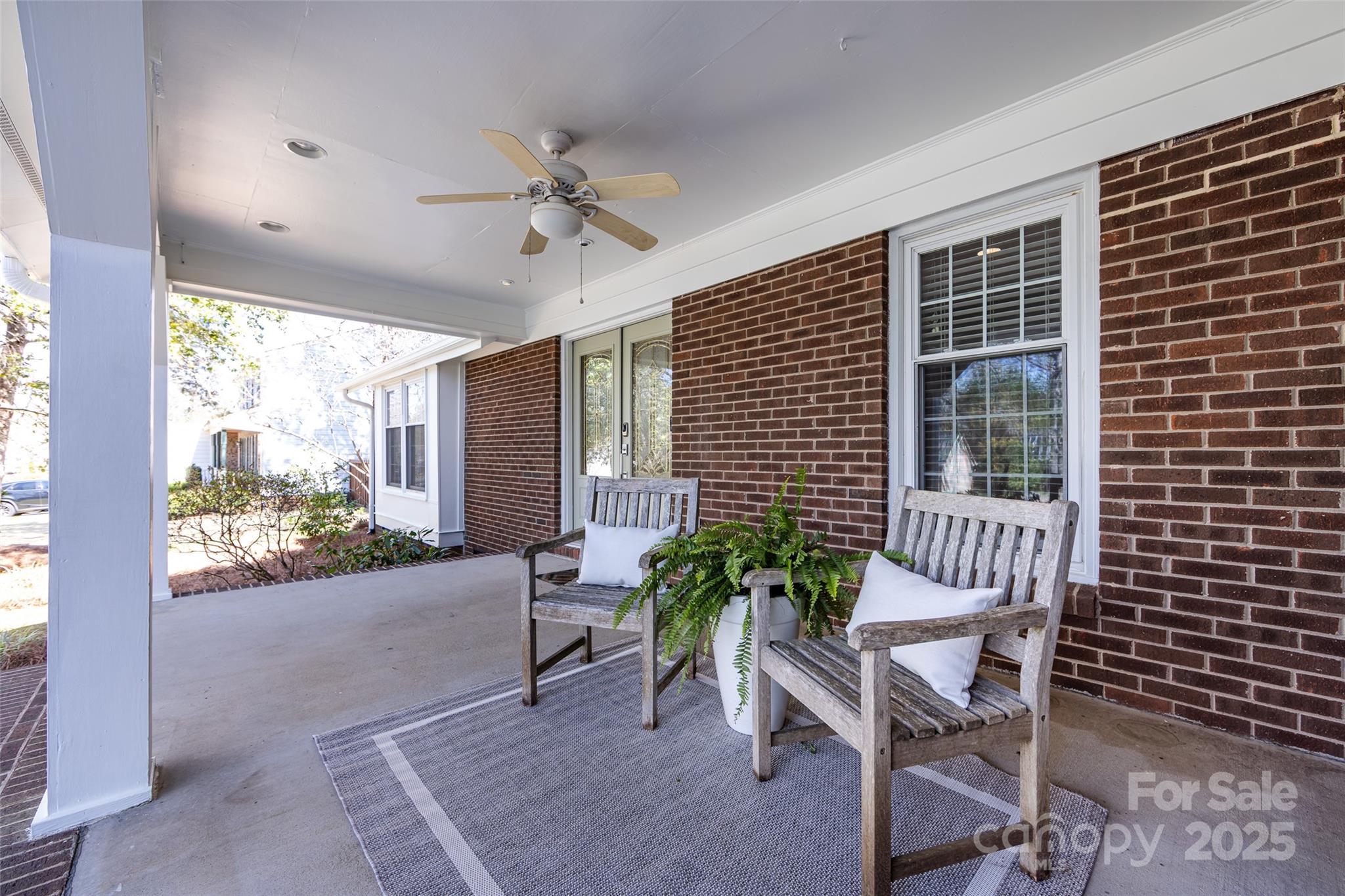 5013 Cedar Forest Drive Charlotte, NC 28226 - Photo 5 of 46 a living room with furniture and a potted plant