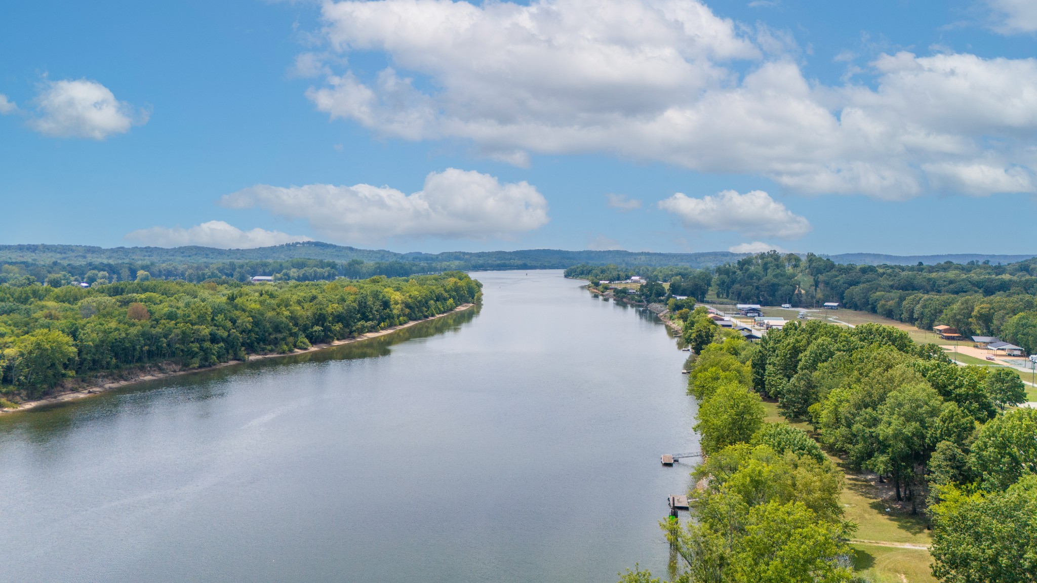 1020 WC PICKETT Road Clifton, TN 38425 - Photo 21 of 25 a view of a lake with a city