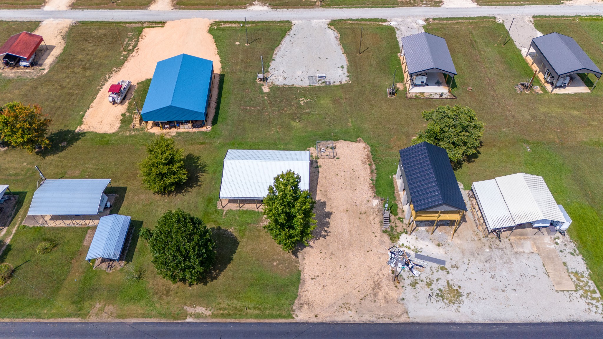 1020 WC PICKETT Road Clifton, TN 38425 - Photo 4 of 25 an aerial view of a houses with yard