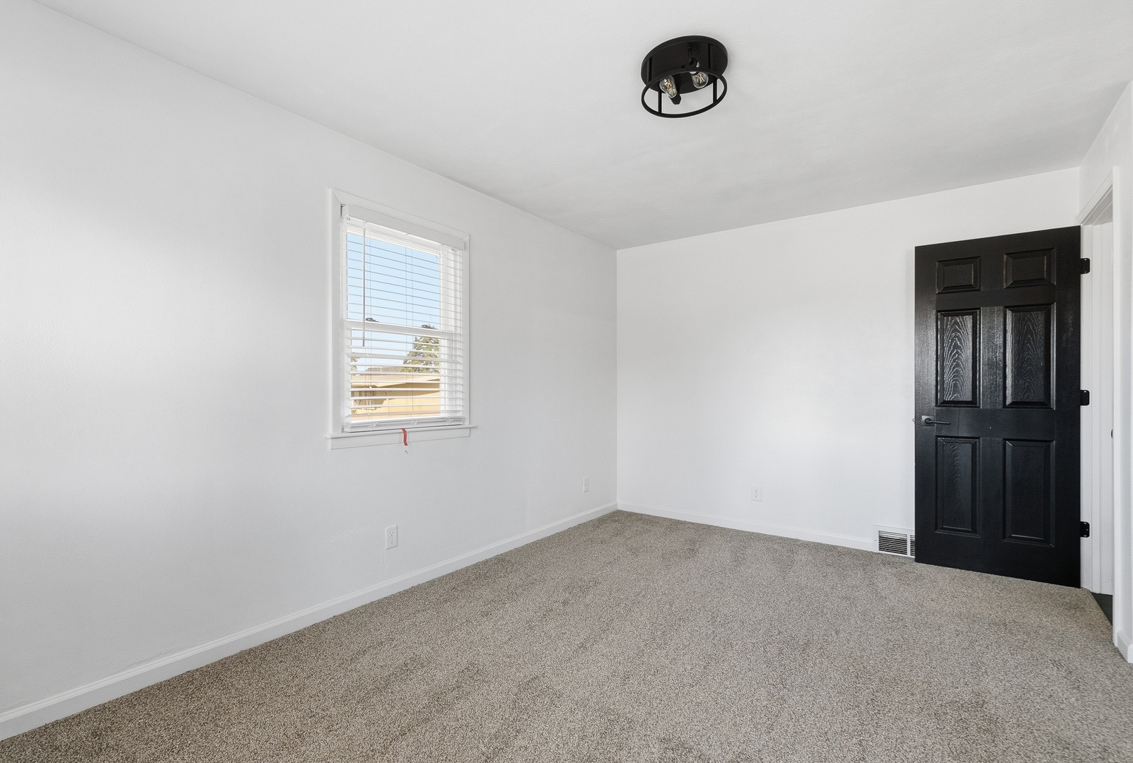 11622 27th Street West Milan, IL 61264 - Photo 23 of 49 an empty room with windows