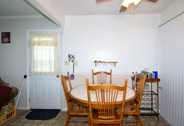 a view of a dining room with furniture