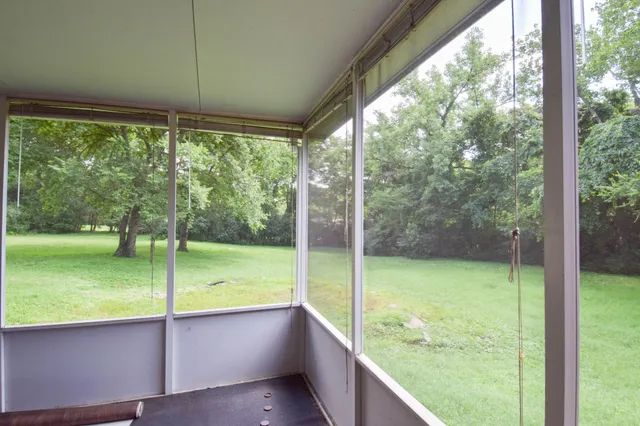 a bathroom with a large window