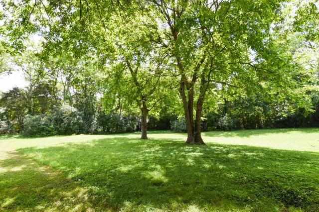 a view of an outdoor space with a lake view