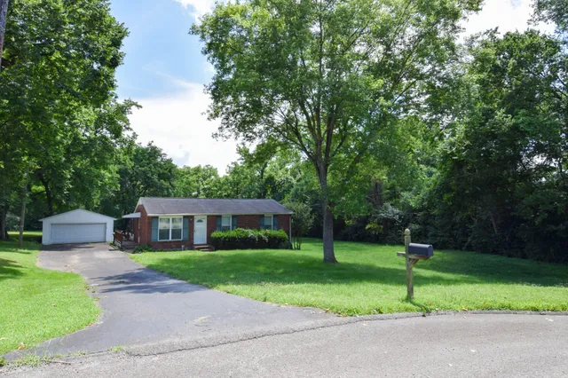 a house view with a garden space