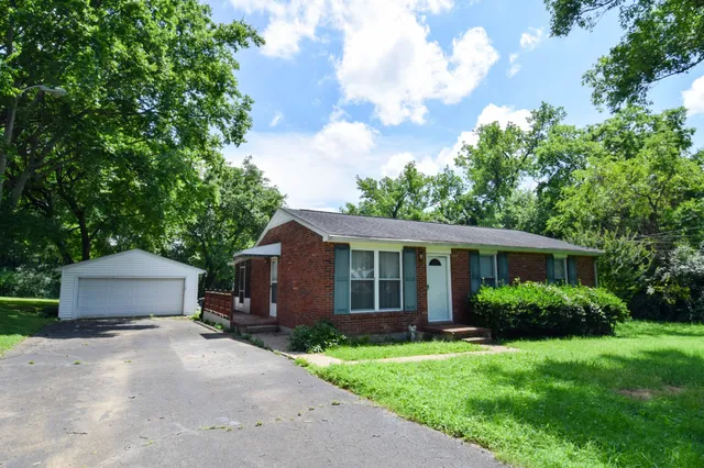 a house view with a garden space