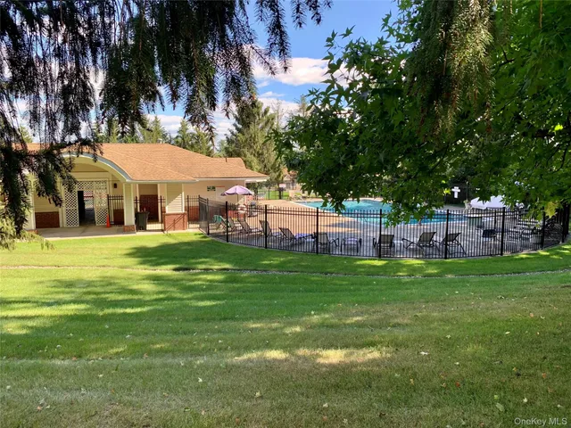a view of a house with a big yard