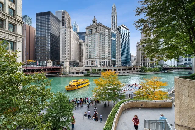 a front view of a house with swimming pool garden and outdoor seating