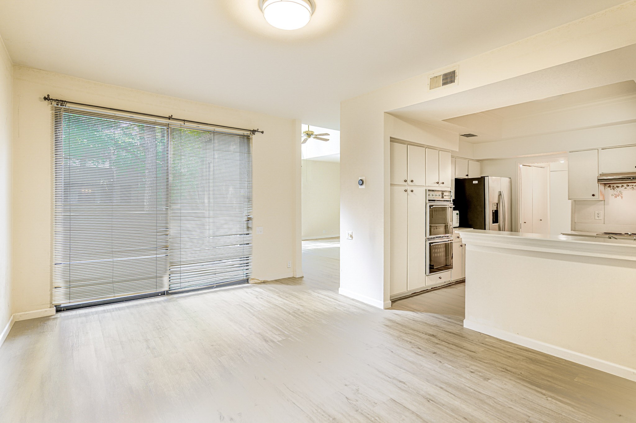 152 Litchfield Lane Houston, TX 77024 - Photo 13 of 33 a view of a kitchen with a refrigerator and a sink