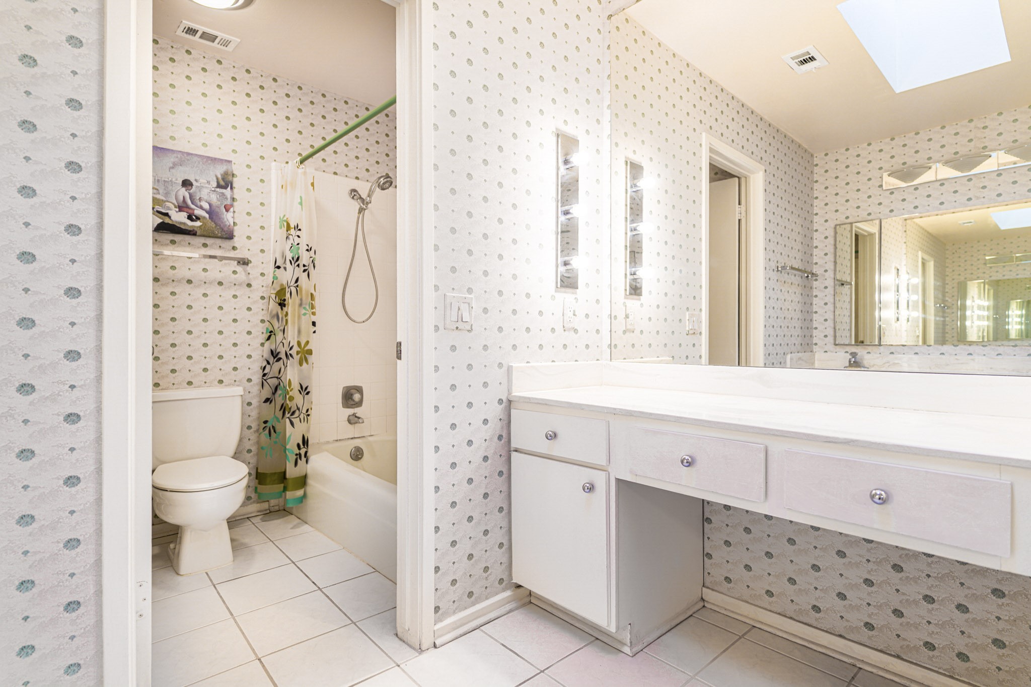 152 Litchfield Lane Houston, TX 77024 - Photo 21 of 33 a bathroom with a sink a toilet and shower