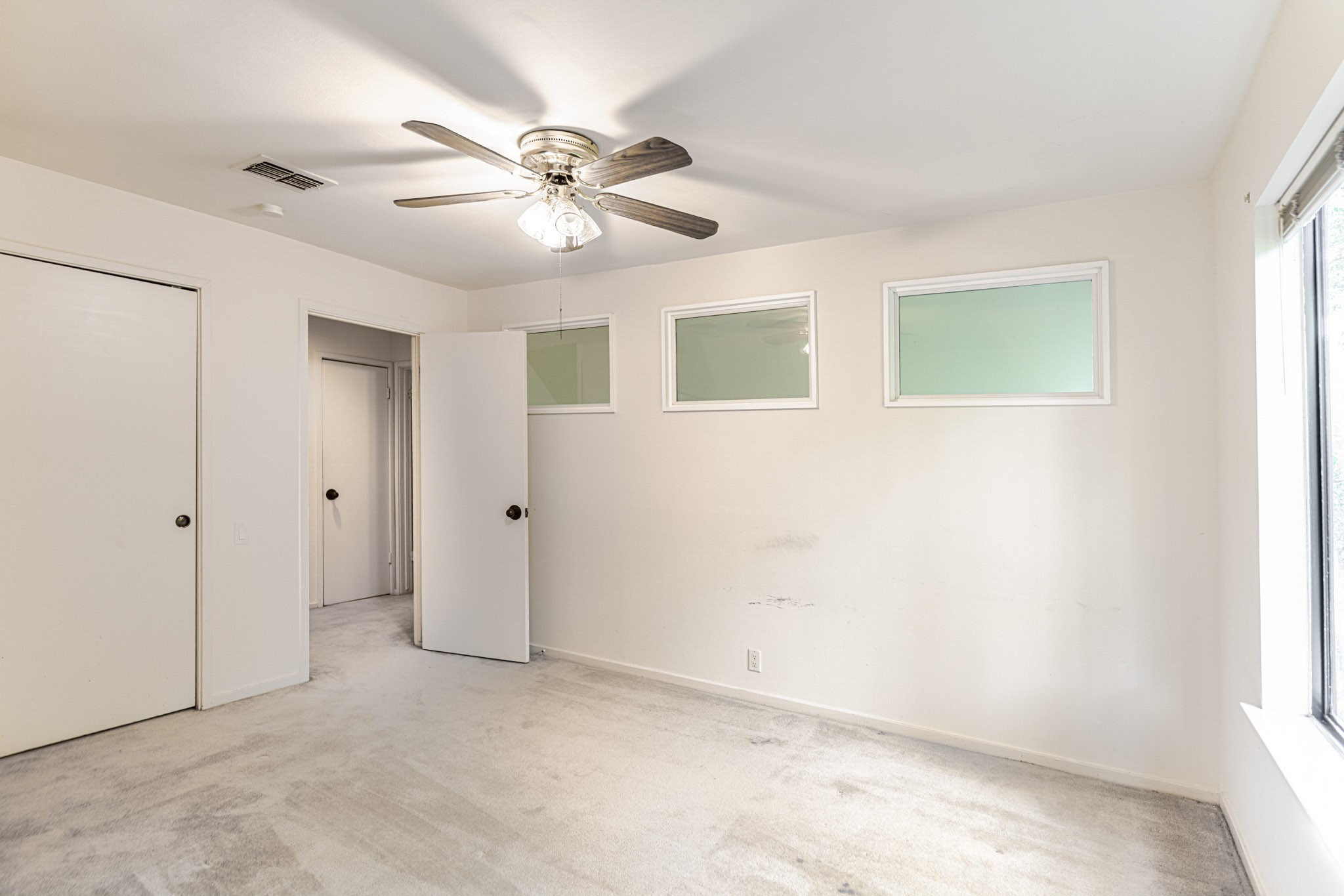 152 Litchfield Lane Houston, TX 77024 - Photo 27 of 33 a view of an empty room