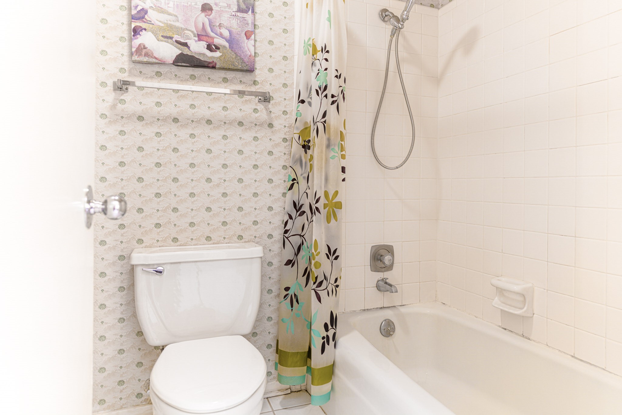 152 Litchfield Lane Houston, TX 77024 - Photo 29 of 33 a white toilet sitting next to a bathroom sink