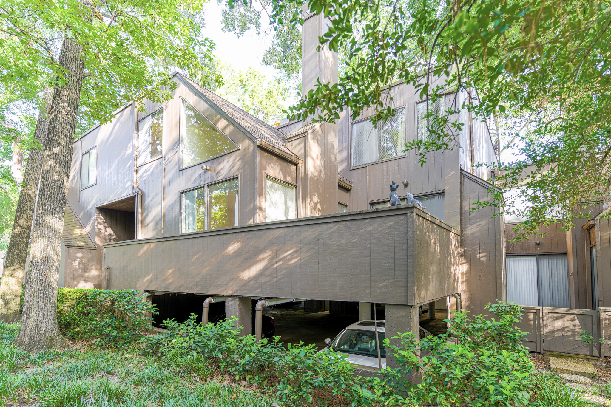 152 Litchfield Lane Houston, TX 77024 - Photo 3 of 33 an aerial view of a house with a yard and large trees