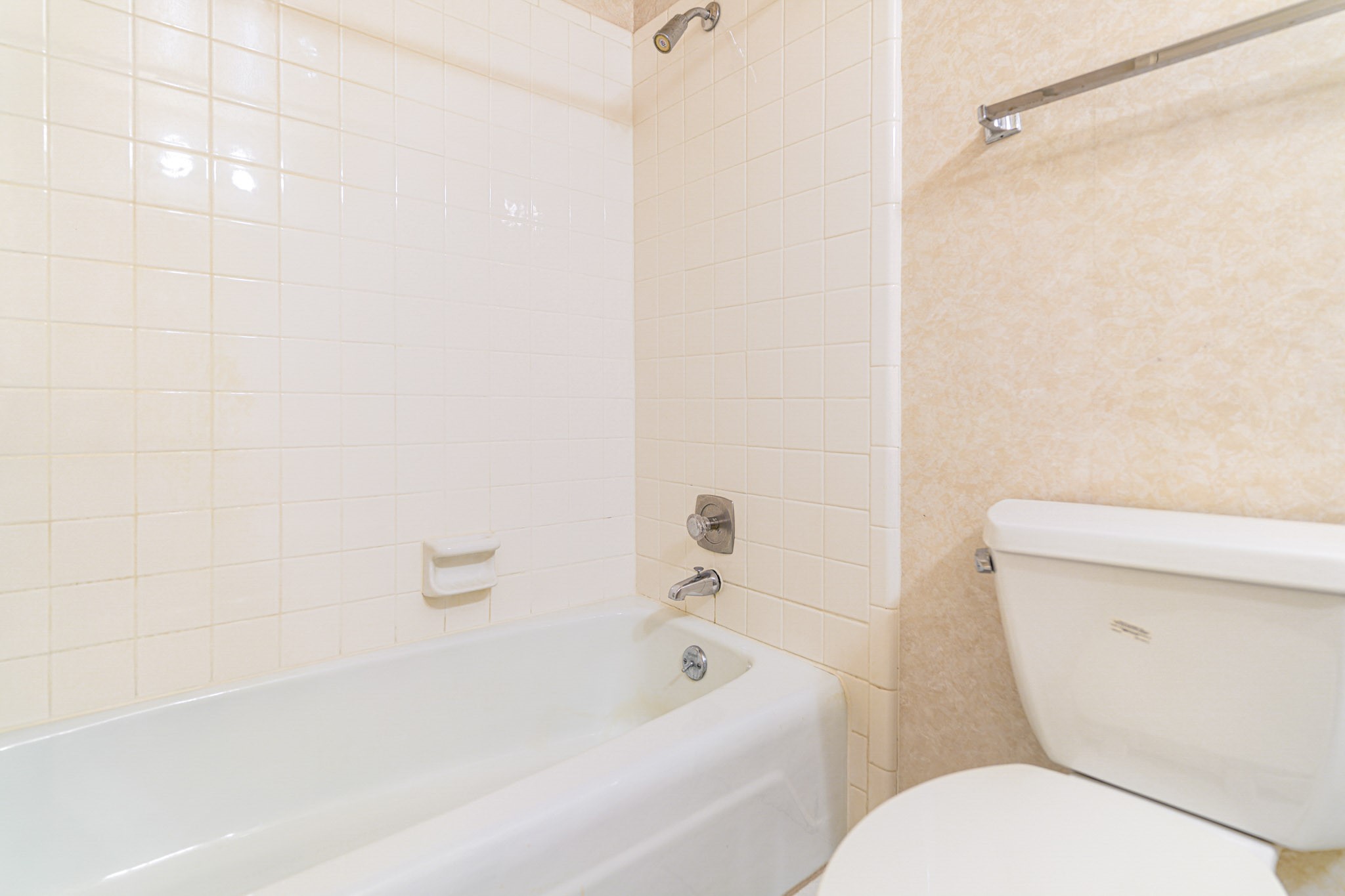 152 Litchfield Lane Houston, TX 77024 - Photo 33 of 33 a white toilet sitting next to a bath tub