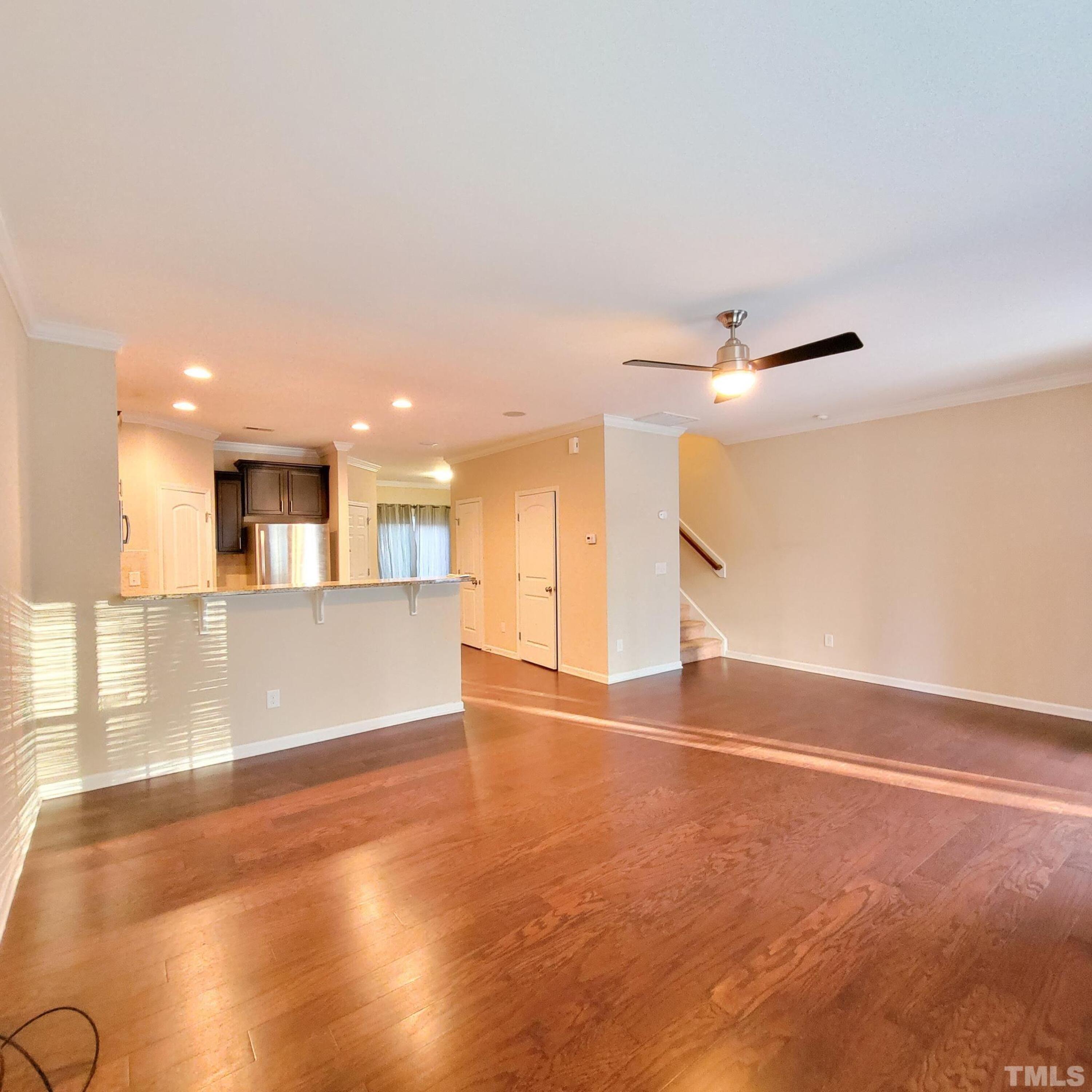 1007 Ileagnes Road Raleigh, NC 27603 - Photo 4 of 29 a view of empty room with wooden floor