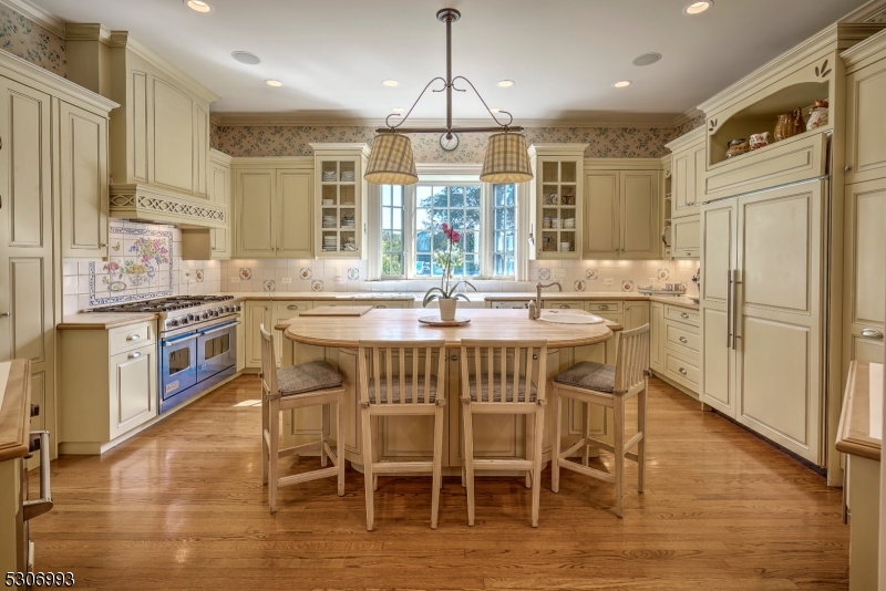 455 Long Lane Bedminster, NJ 07931 - Photo 15 of 46 a view of a dining room with furniture window and wooden floor