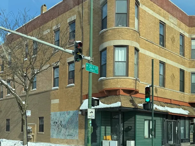 a front view of a building with glass windows