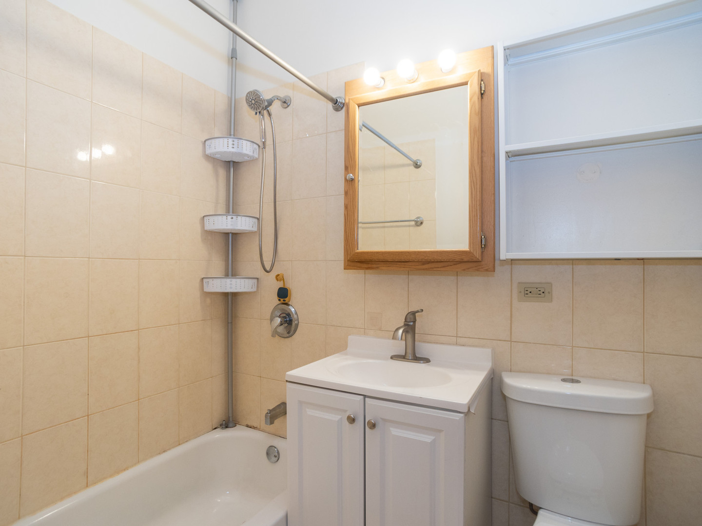 1758 West 35th Street, Unit 3R Chicago, IL 60609 - Photo 6 of 13 a bathroom with a sink a toilet and shower